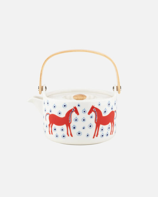 Decorative ceramic teapot with red horse designs on a white background