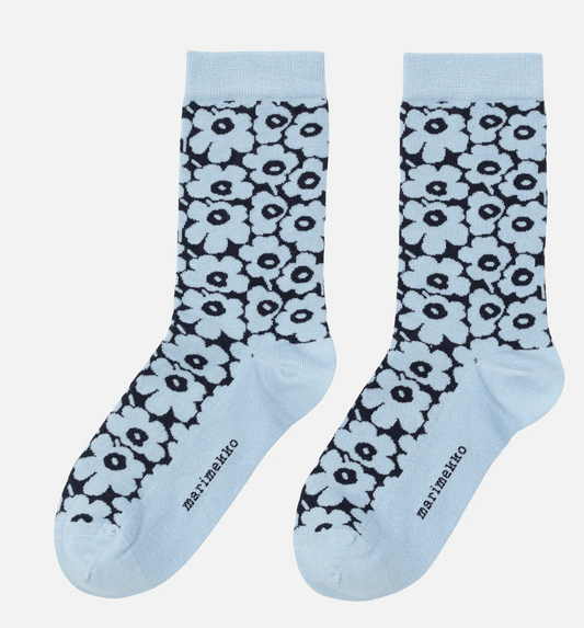 Light Blue Marimekko socks with black floral pattern on a white background