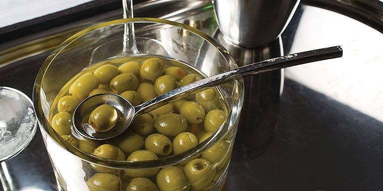 Shiny Hammered Olive Spoon 7"L